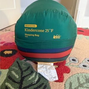 REI Kindercone Kids Sleeping Bag in Green with Blue and Red Stripes